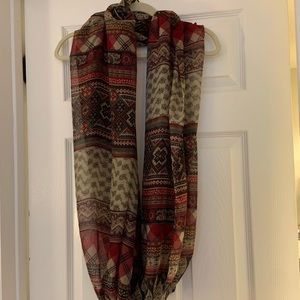 Pennington’s burgundy scarf